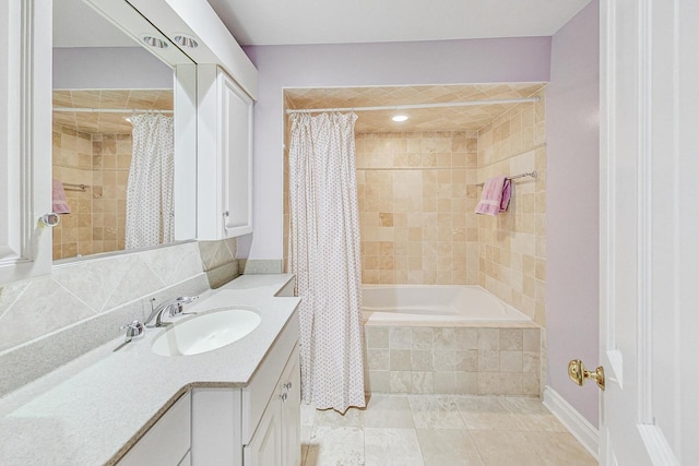 bathroom featuring shower / bathtub combination with curtain and vanity