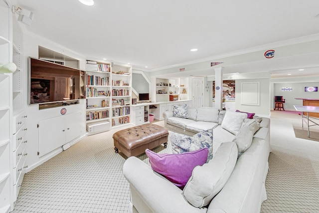 carpeted living room with ornamental molding