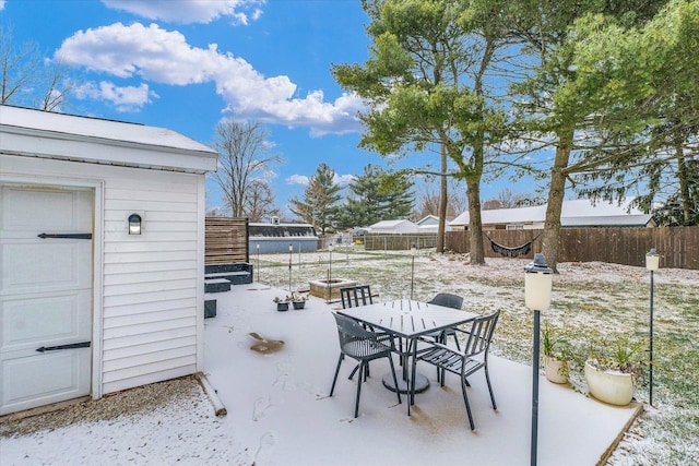 view of snow covered patio