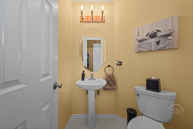 bathroom featuring toilet