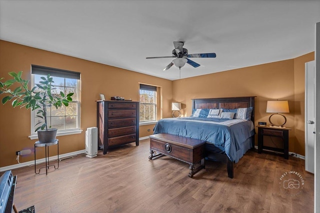 bedroom featuring ceiling fan and hardwood / wood-style floors