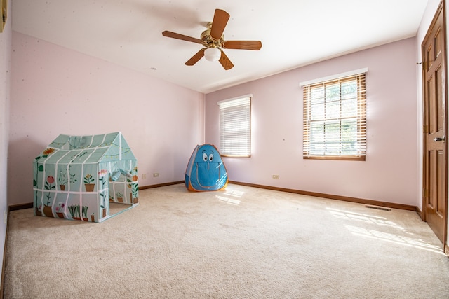 carpeted bedroom featuring ceiling fan