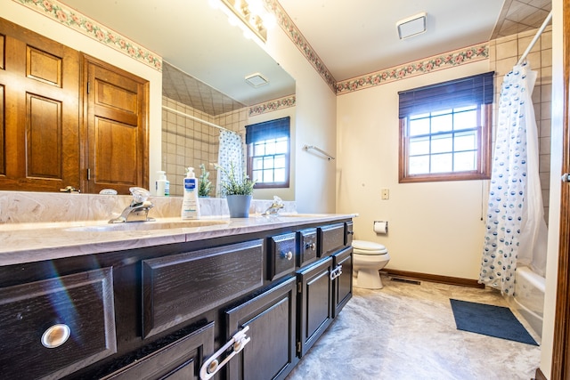 full bathroom with shower / bathtub combination with curtain, vanity, and toilet