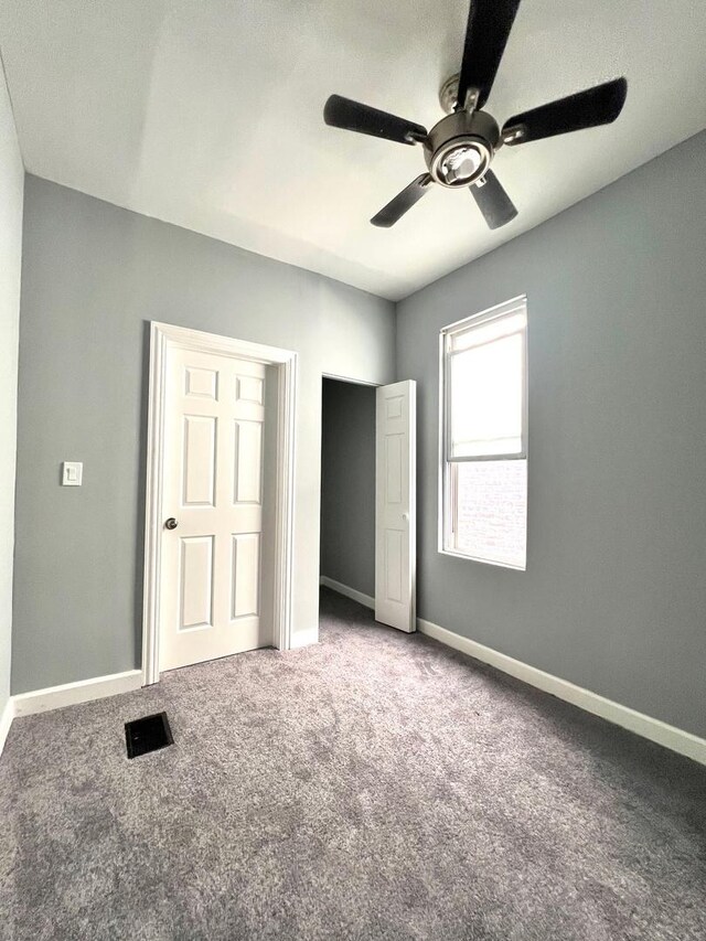 bonus room featuring lofted ceiling and carpet