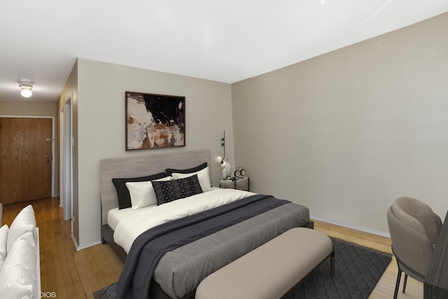 bedroom featuring light wood-type flooring