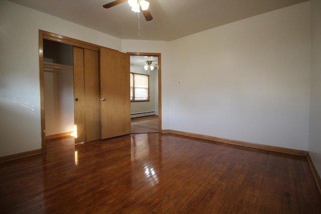 unfurnished bedroom featuring ceiling fan, a closet, a baseboard radiator, and dark hardwood / wood-style floors