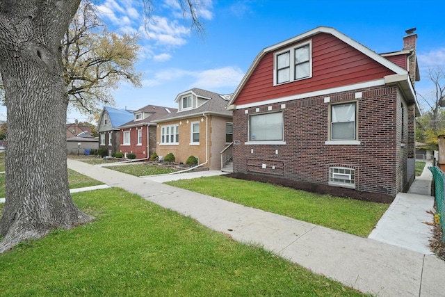 view of front facade with a front yard