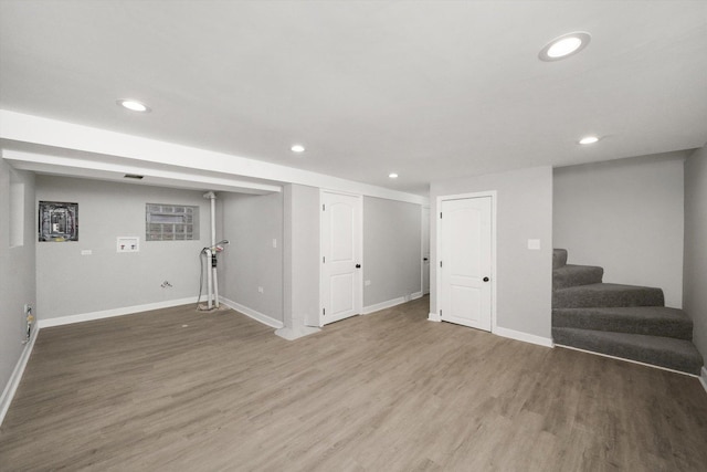 basement featuring wood-type flooring