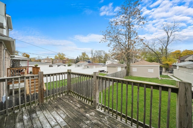 deck featuring a lawn