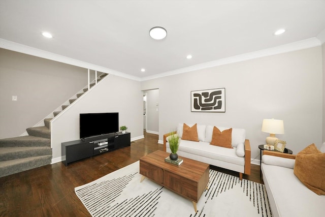 living room with crown molding and dark hardwood / wood-style floors