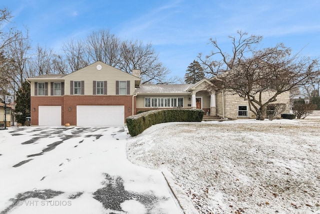 view of front of home with a garage