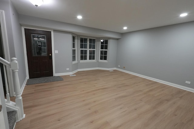 foyer with light hardwood / wood-style flooring