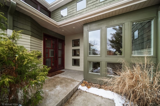 entrance to property featuring a patio area