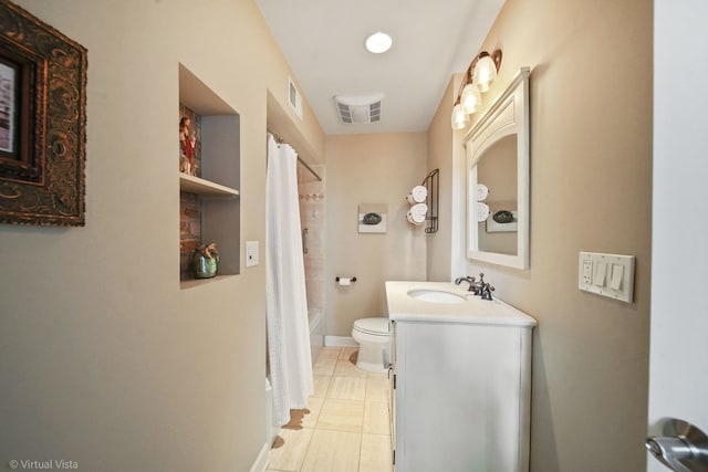 full bathroom with tile patterned flooring, vanity, shower / bath combo, and toilet