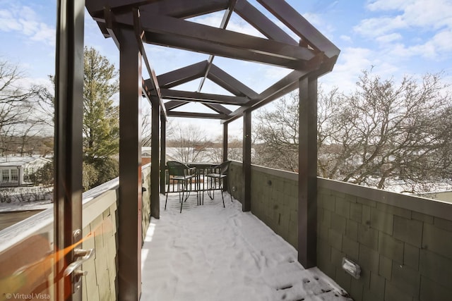 view of snow covered deck