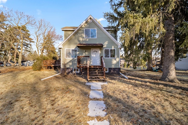 view of front of property with a wooden deck