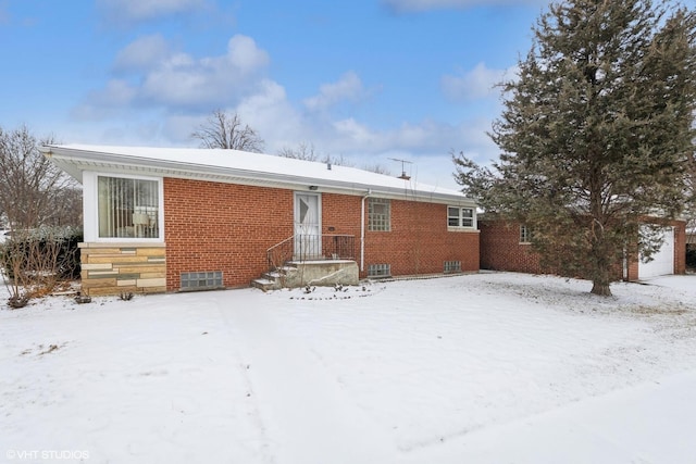 view of snow covered property