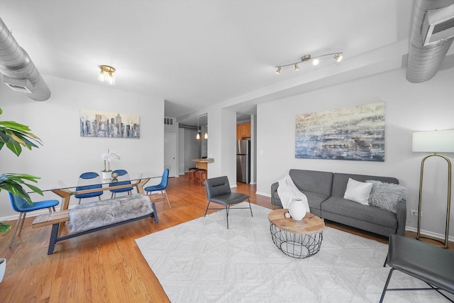 living room featuring hardwood / wood-style floors