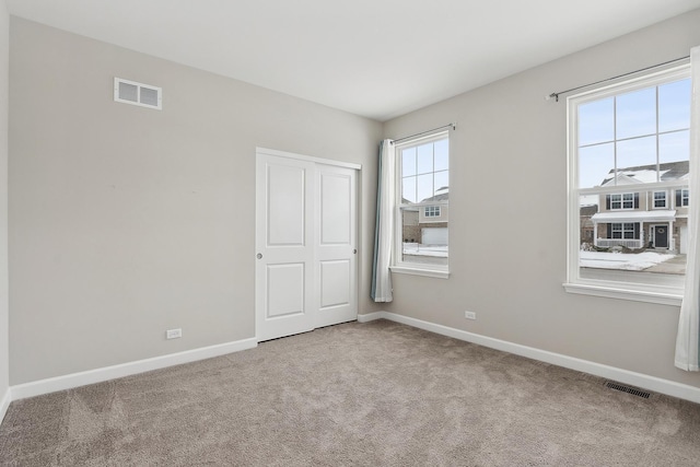 view of carpeted spare room