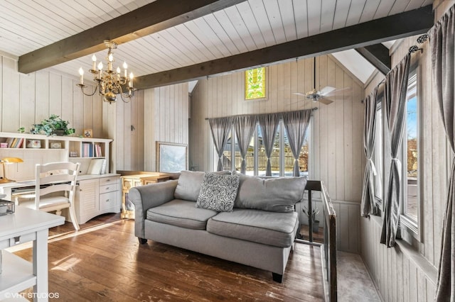 living room featuring wood-type flooring, ceiling fan with notable chandelier, wooden walls, and wooden ceiling