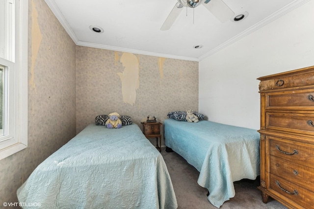 bedroom featuring ceiling fan, carpet floors, and crown molding