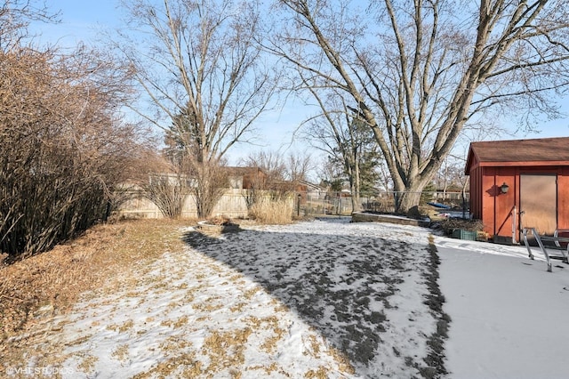 view of yard layered in snow