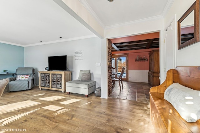 living room with ornamental molding and hardwood / wood-style floors