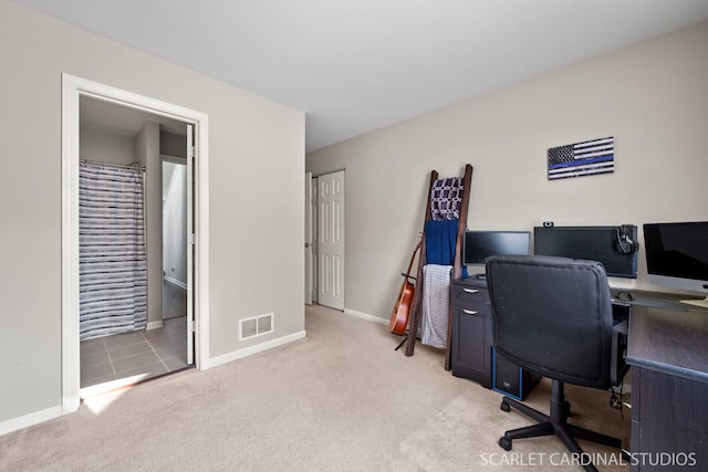 office space with light carpet