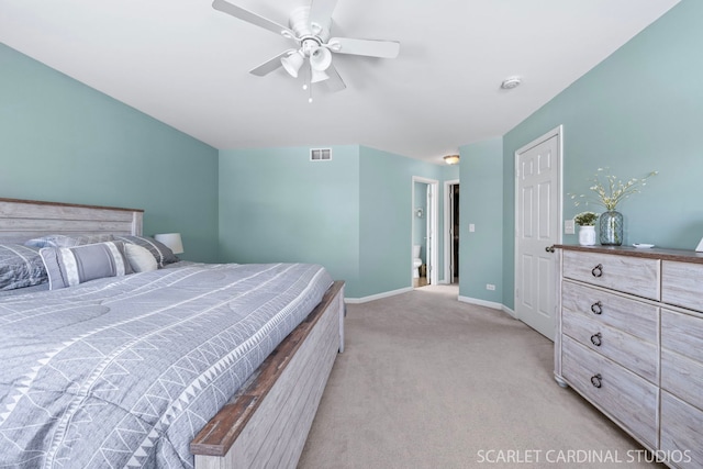 bedroom featuring light colored carpet and ceiling fan