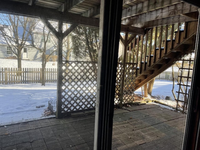 view of snow covered patio