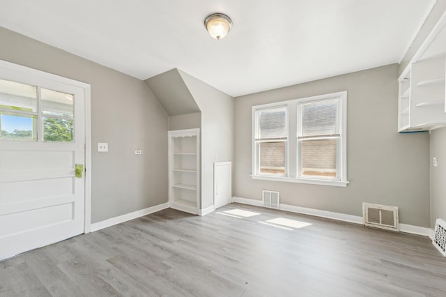 foyer with light hardwood / wood-style flooring