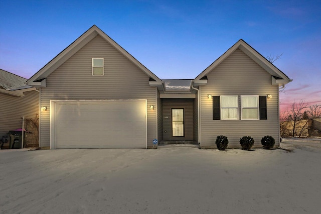 view of front of property featuring a garage