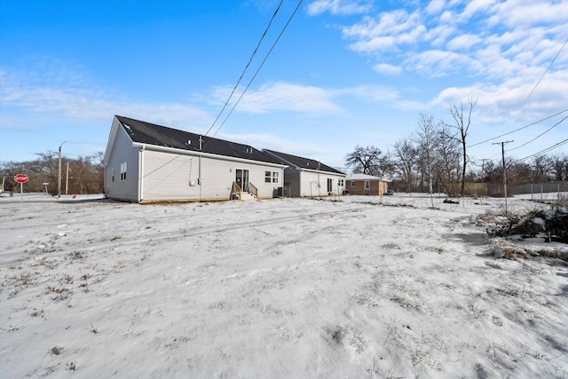 view of snow covered property