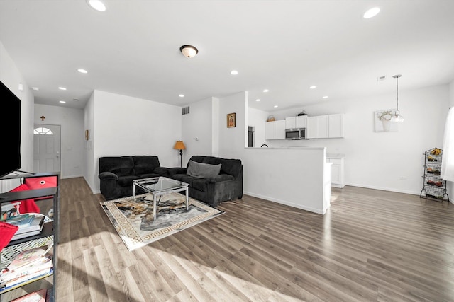 living room with hardwood / wood-style floors