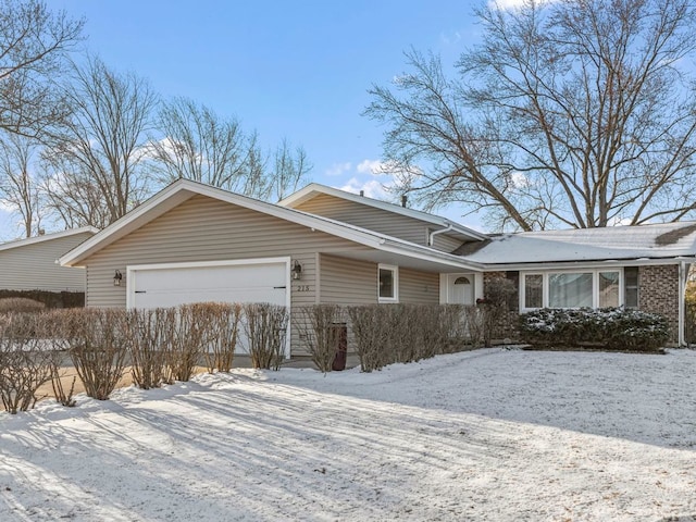 view of front of home with a garage