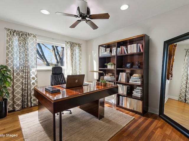 office area featuring hardwood / wood-style floors and ceiling fan