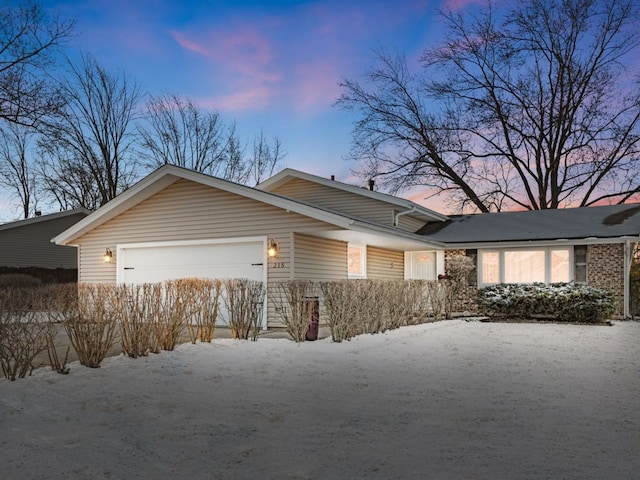 view of front of home featuring a garage