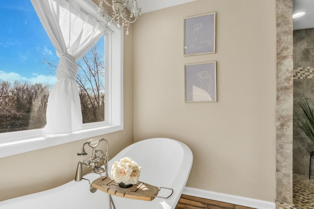 sitting room featuring a chandelier