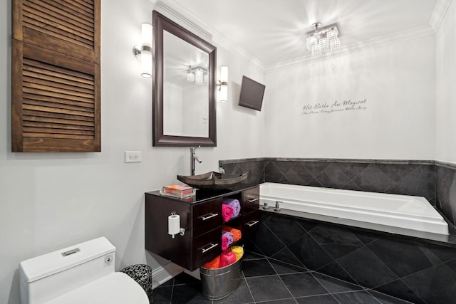 bathroom with crown molding, tile patterned floors, a relaxing tiled tub, and sink