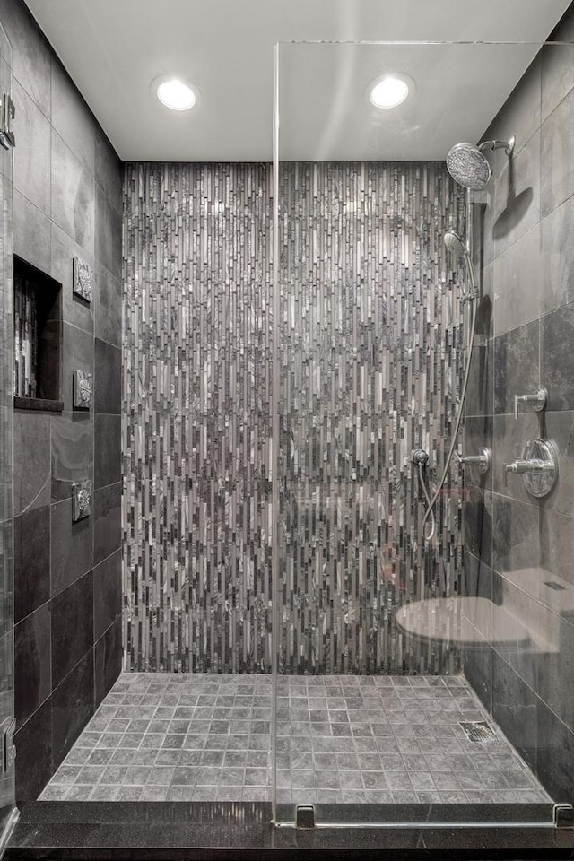 bathroom with tiled shower