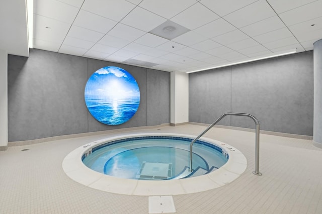 view of pool with an indoor in ground hot tub