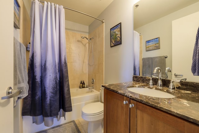 full bathroom featuring tile patterned flooring, shower / tub combo with curtain, vanity, and toilet