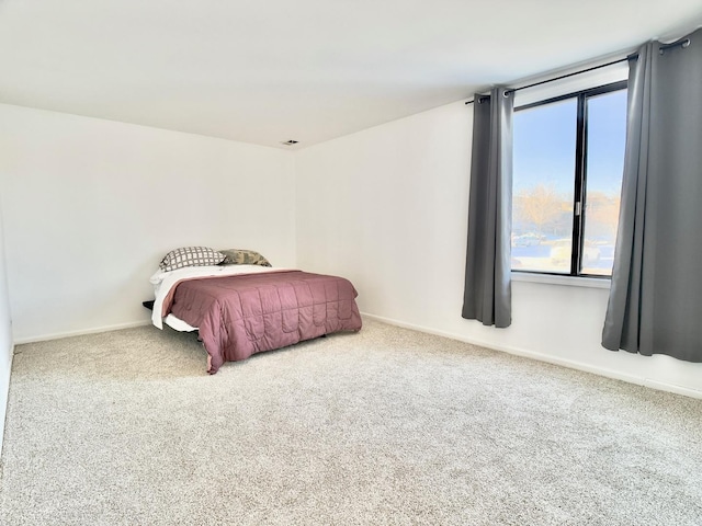 bedroom featuring carpet