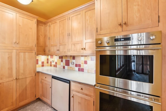 kitchen featuring tasteful backsplash, refrigerator, light brown cabinets, and double oven