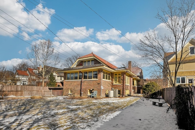 exterior space featuring central AC unit