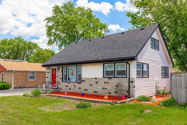 view of front of home with a front lawn