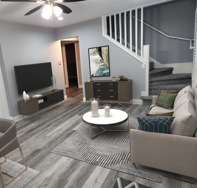 living room with ceiling fan and wood-type flooring