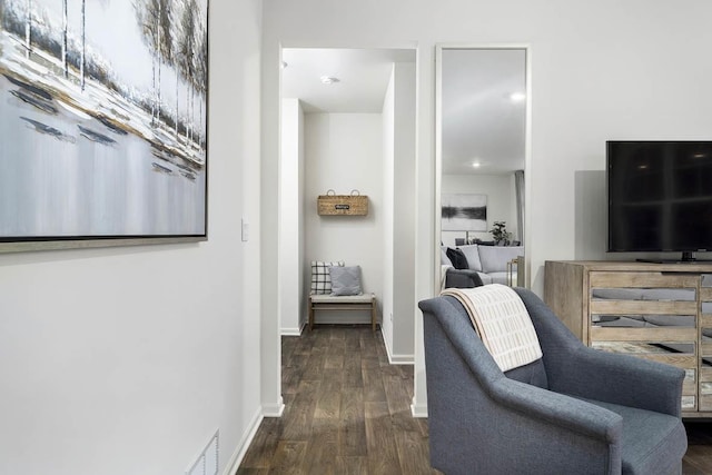 living room featuring dark hardwood / wood-style flooring