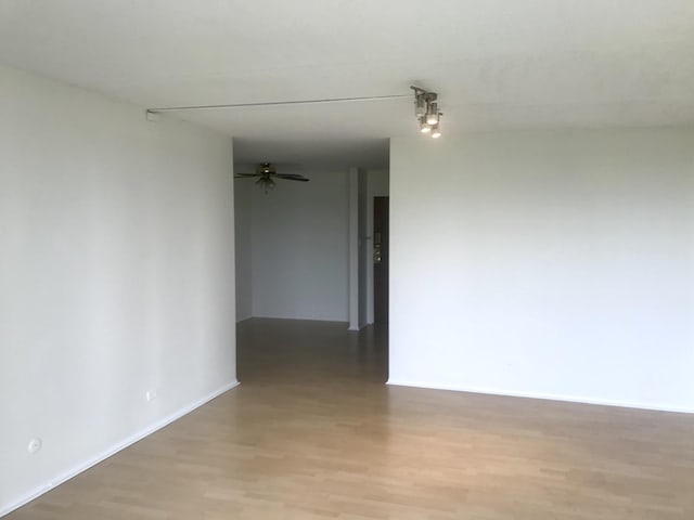 unfurnished room featuring light hardwood / wood-style flooring