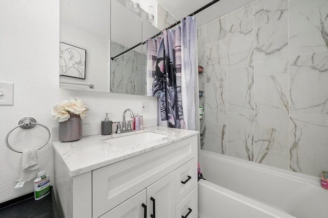 bathroom featuring shower / bath combo with shower curtain and vanity